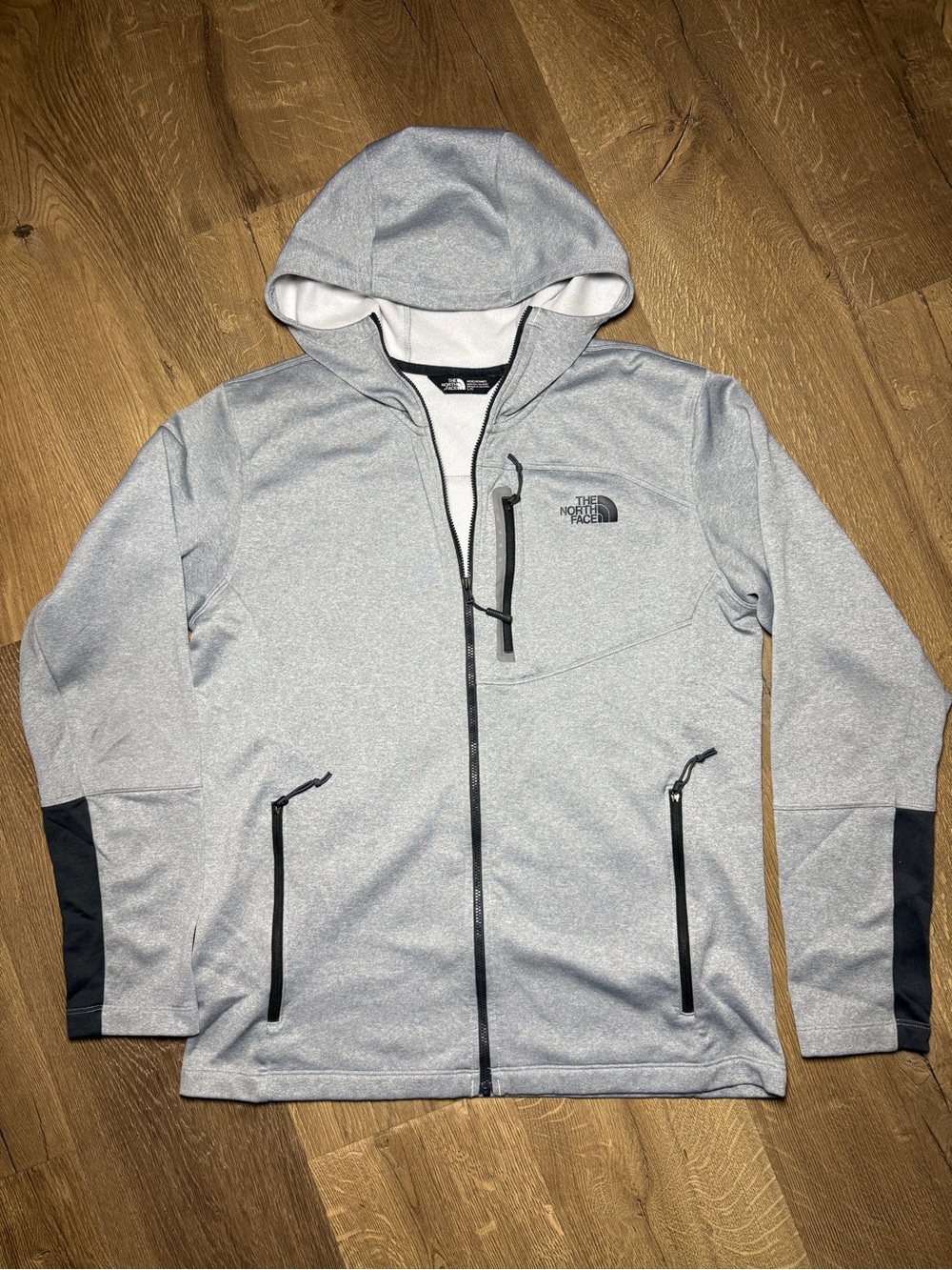 The North Face Men's Light Gray Hooded Softshell Jacket with Black Accents